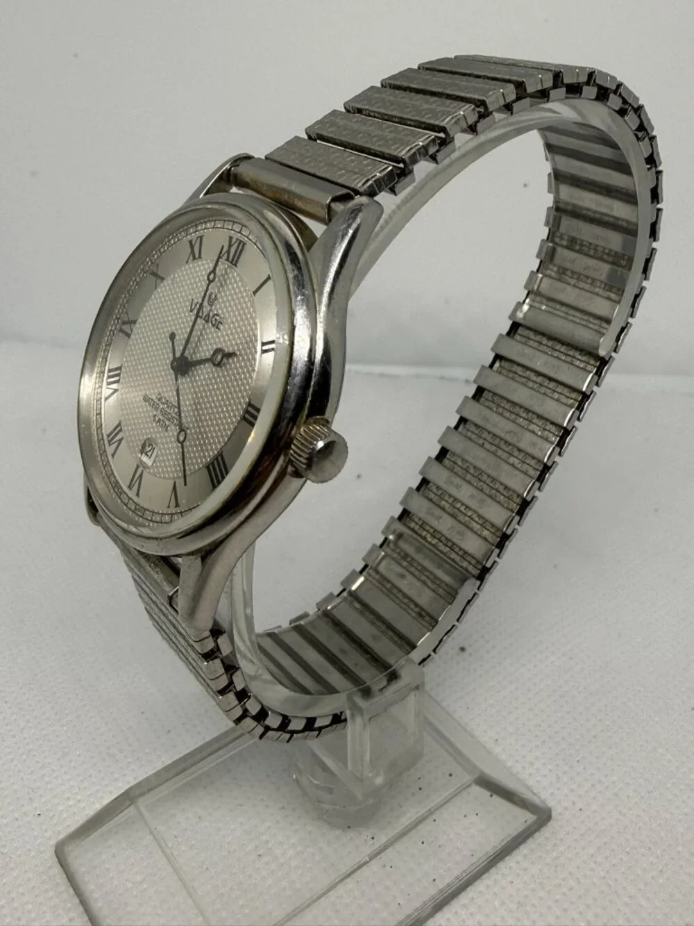 Visage Quartz Wristwatch Silver Dial Textured Center Roman Numerals 13370